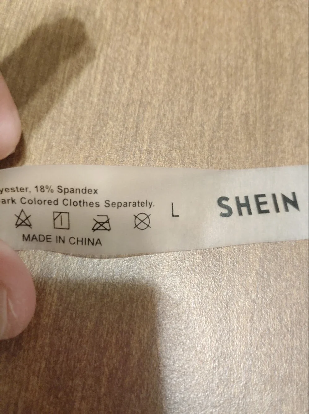 SHEIN Cream Fabric Care Label with Black Print